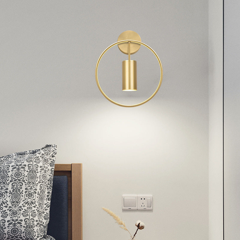 Round golden wall lamp